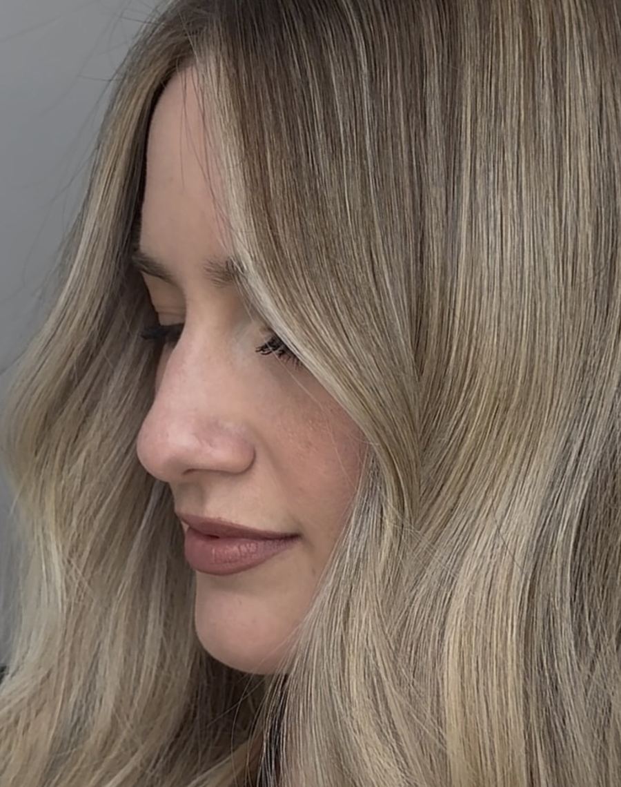 Soft blonde balayage at Ra'pôr Salon in Costa Mesa