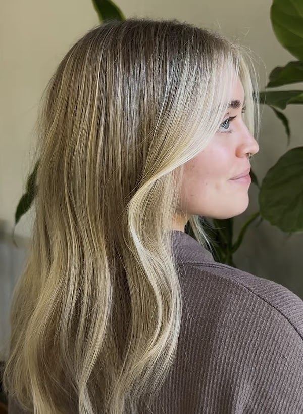 Blonde face framing highlights at Ra'pôr Salon in Costa Mesa